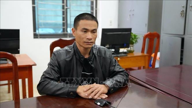 Bị can Nguyễn Văn Thâm tại cơ quan Công an. Ảnh- TTXVN phát